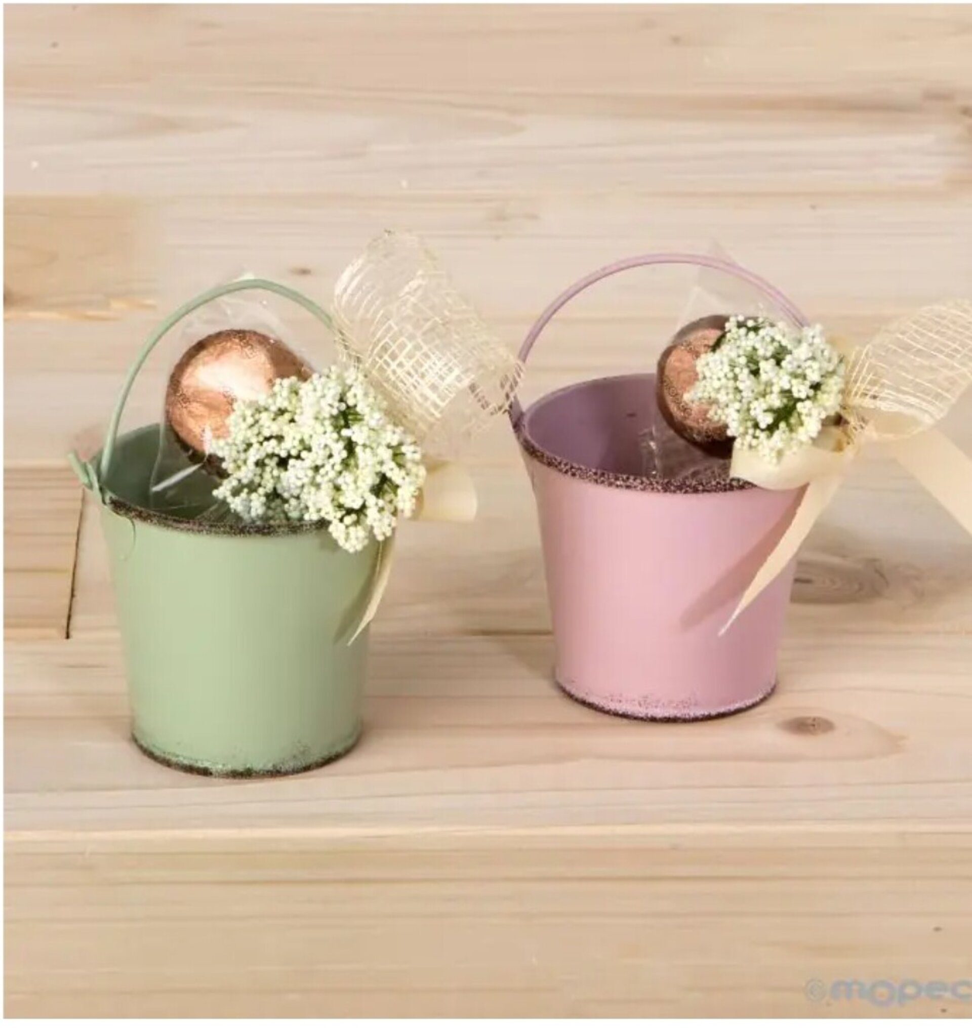 Cubo metálico verde y malva stdo.con flor y bombón, 2.50€  min.2 - 2